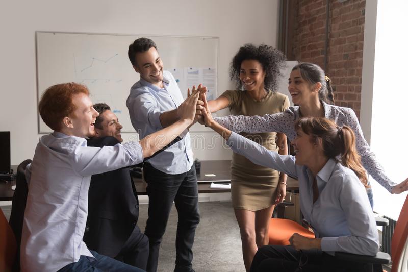 image-858874-happy-diverse-office-employees-group-give-high-five-corporate-trust-concept-happy-motivated-diverse-office-employees-group-give-140990305-c20ad.jpg